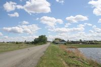 Село Прилогино Лебяжьевского района Курганской области — Въездной знак. Фото Владимира Шевцова, 2022 год.